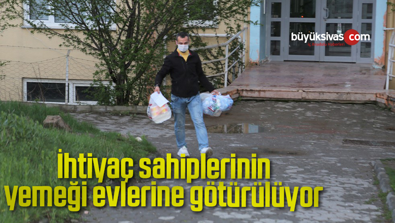 İhtiyaç sahiplerinin yemeği evlerine götürülüyor