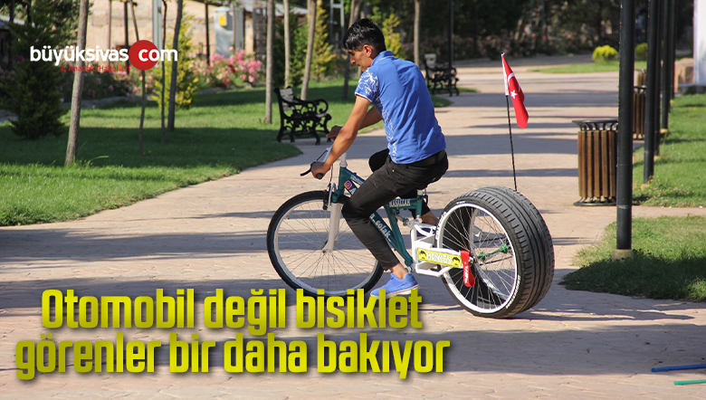 bisikletine taktığı