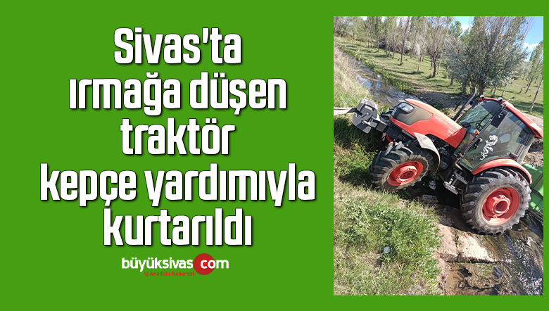 Irmağa düşen traktör kepçe yardımıyla kurtarıldı