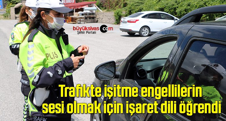 Trafikte işitme engellilerin sesi olmak için işaret dili öğrendi