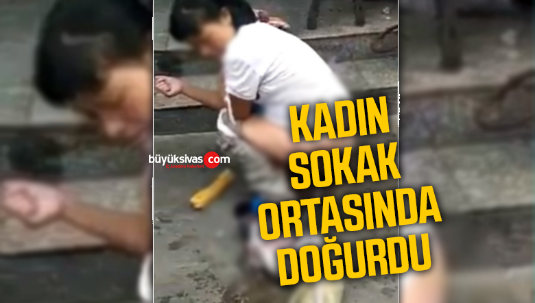 Kadın sokak ortasında doğurdu