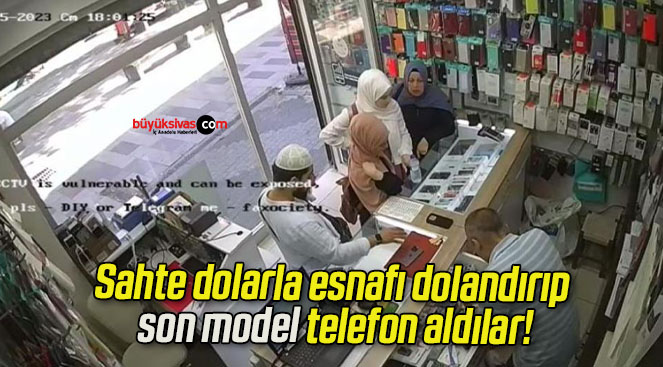 Sahte dolarla esnafı dolandırıp son model telefon aldılar!