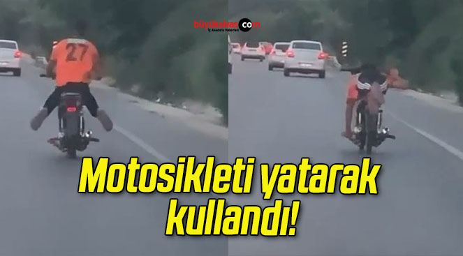 Motosikleti yatarak kullandı!
