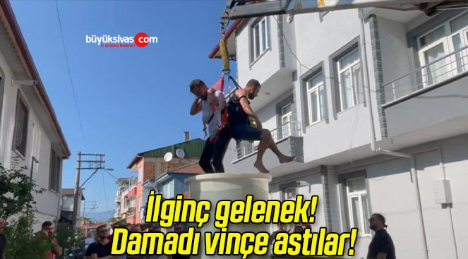İlginç gelenek! Damadı vinçe astılar!
