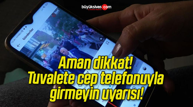 Aman dikkat! Tuvalete cep telefonuyla girmeyin uyarısı!