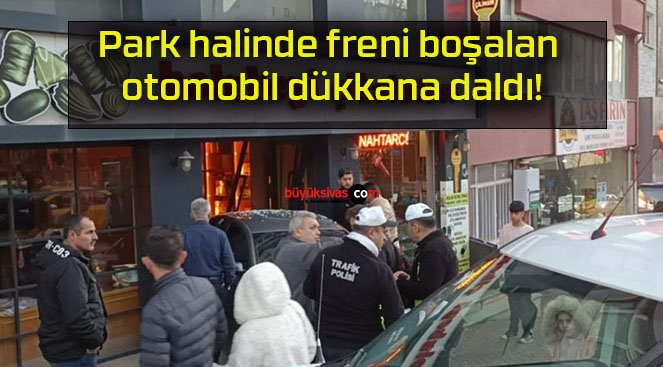 Park halinde freni boşalan otomobil dükkana daldı!