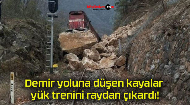 Demir yoluna düşen kayalar yük trenini raydan çıkardı!