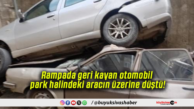 Rampada geri kayan otomobil park halindeki aracın üzerine düştü!